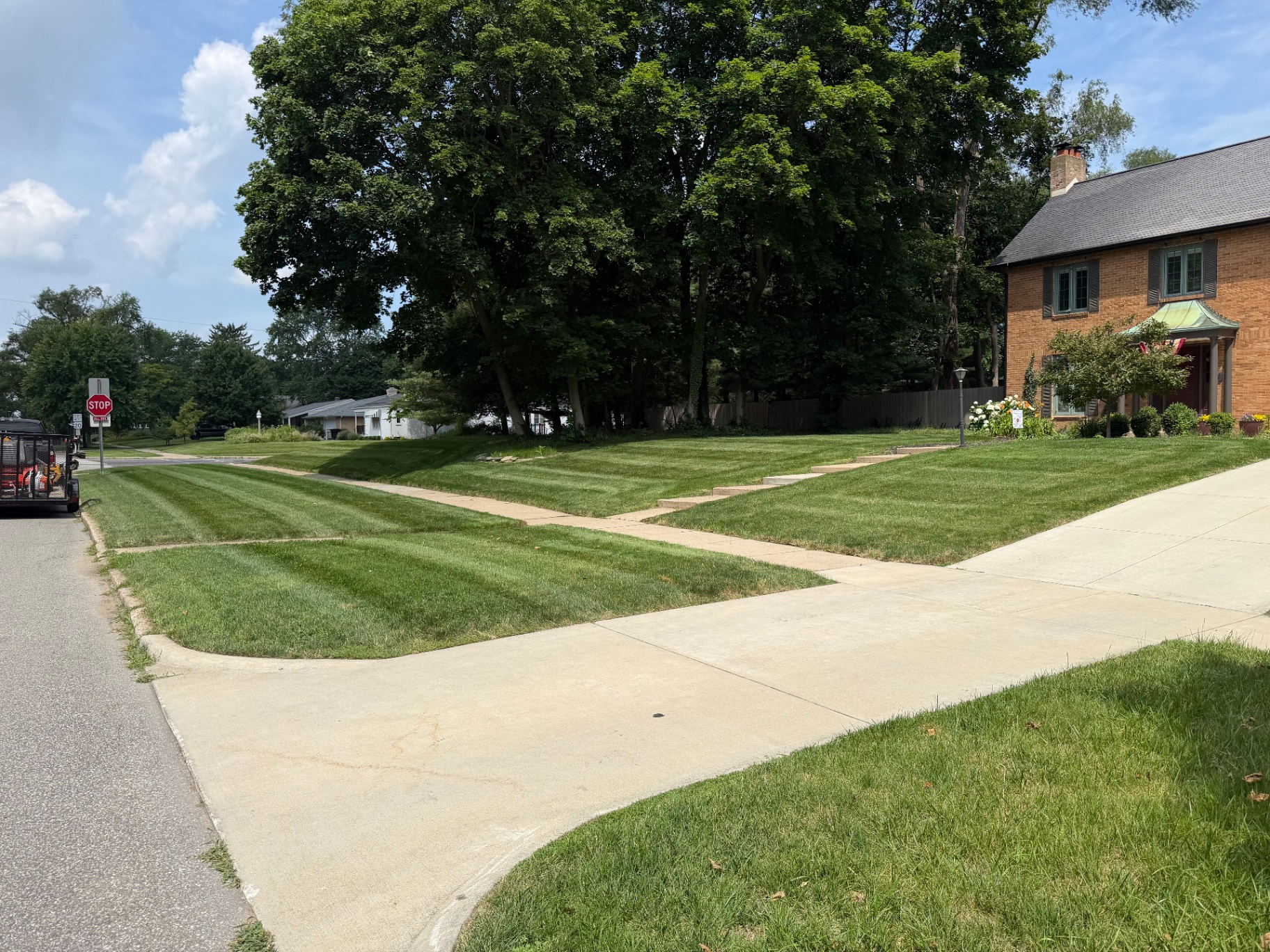 Freshly mowed and striped front lawn on a South Bend street corner